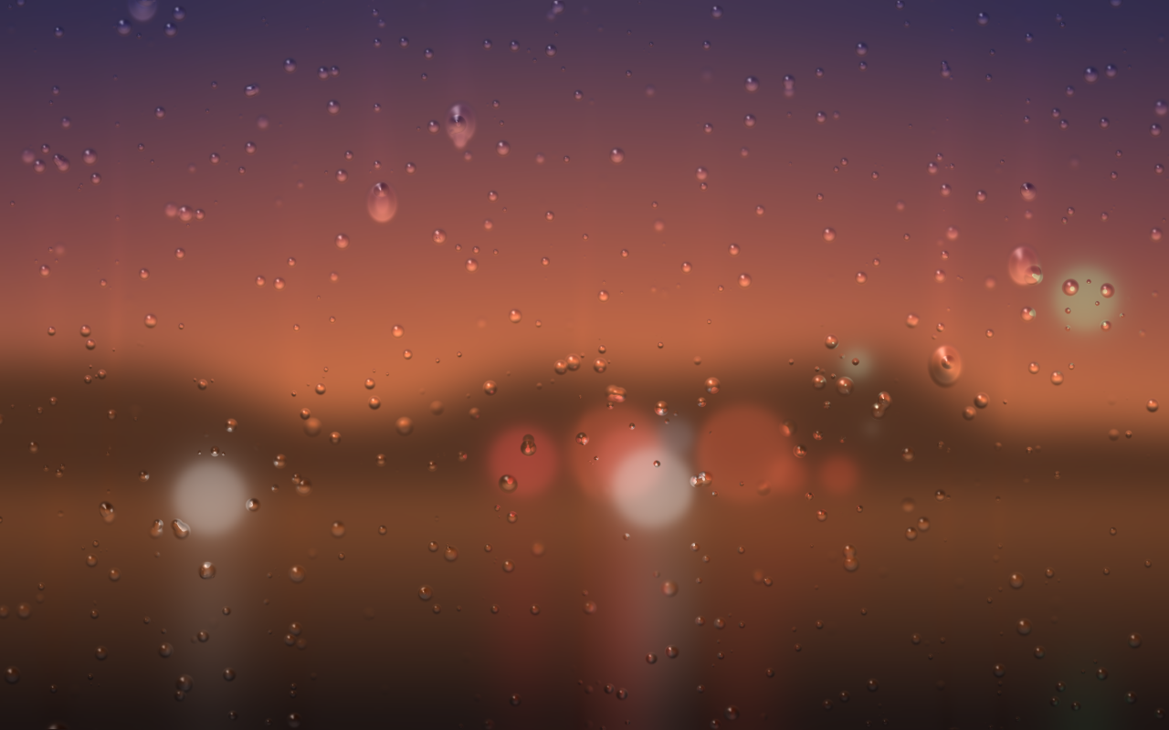 夕焼けの街路に雨